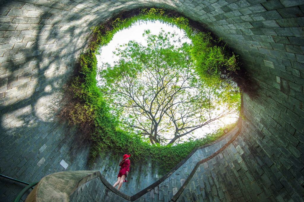 a woman at fort canning park, singapore.